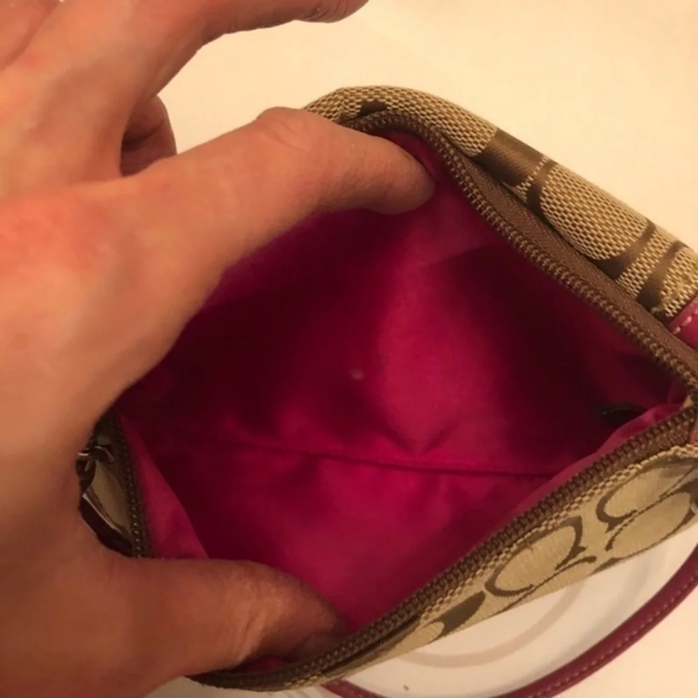 Coach signature brown dark pink leather wristlet